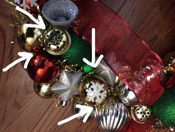 A wreath made out of ornaments has become a classic Christmas decoration. If you've always wanted one, you will be happy and surprised to find out just how easy and cheap it is to create your own! You can even use scratched or damaged ornaments for this project, making it a great way to give new life to old decorations that might otherwise be destined for the trash.