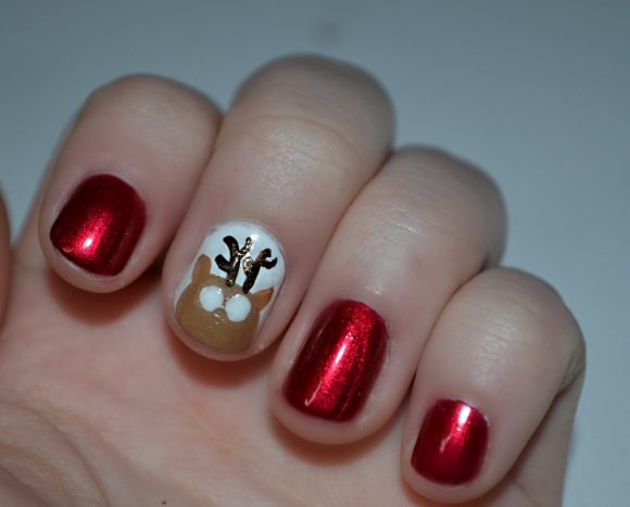 With a few simple steps, some patience, and a bit of practice- you too can rock some fabulous reindeer nail art!