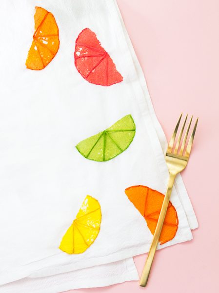 stamped and embroidered citrus tea towel