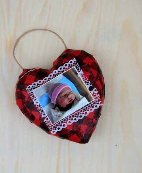 Recycled Gift Wrapping turns into this cute photo heart ornament! Easy craft