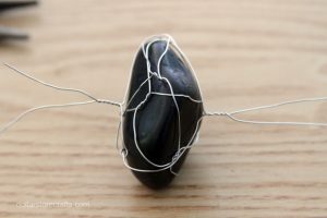Wrapping rocks with wire