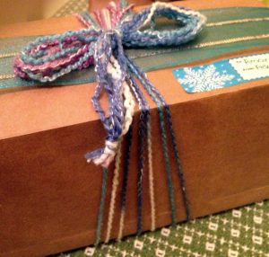 Gift embellished with scrap yarn