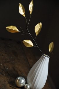 Make gold tape leaves (via dollarstorecrafts.com)
