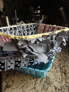 Weave ribbons into a dollar store basket - great way to use up your ribbon stash!