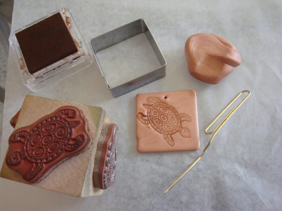 Use a rubber stamp on polymer clay